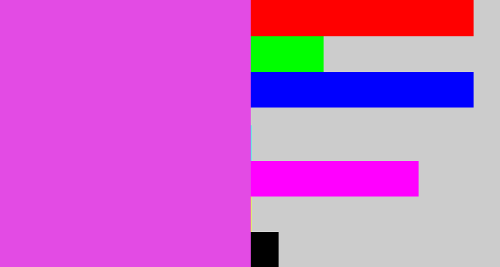 Hex color #e34be4 - pink purple