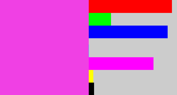 Hex color #f040e4 - purple pink